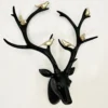 Black Stags Head With Gold Bird Decoration