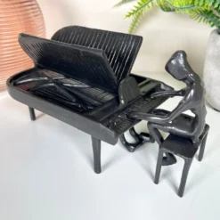 Cast Iron Piano Player Figurine