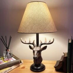 Stags Head Table Lamp With White Linen Shade
